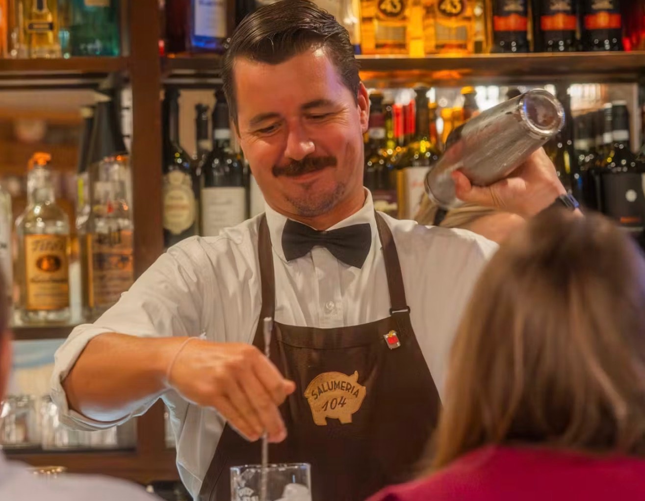 Bartender preparing cocktails at Salumeria 104